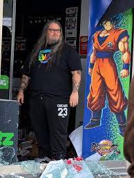 French Goku Hero logo