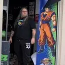 French Goku Hero logo