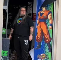 French Goku Hero logo