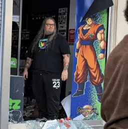 French Goku Hero logo