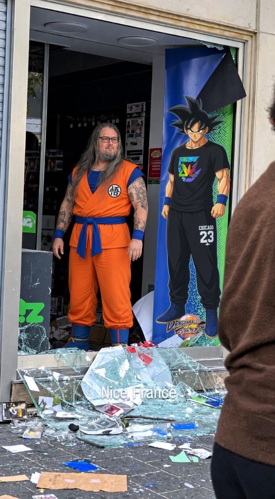 French Goku Hero logo